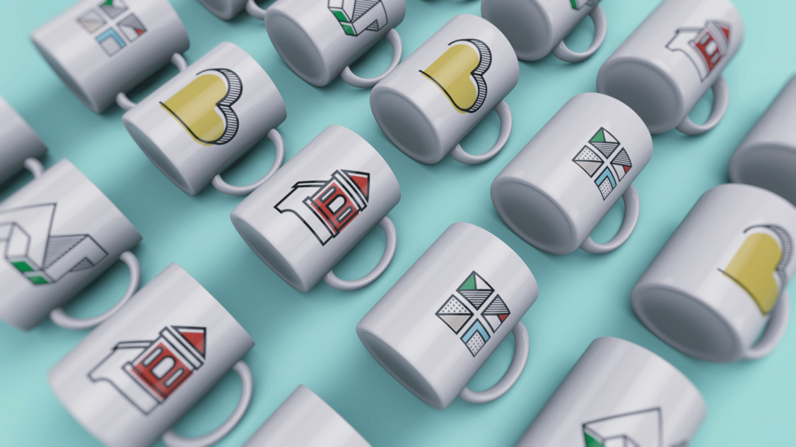 Promotional items with the DAUP logo and the city symbols.